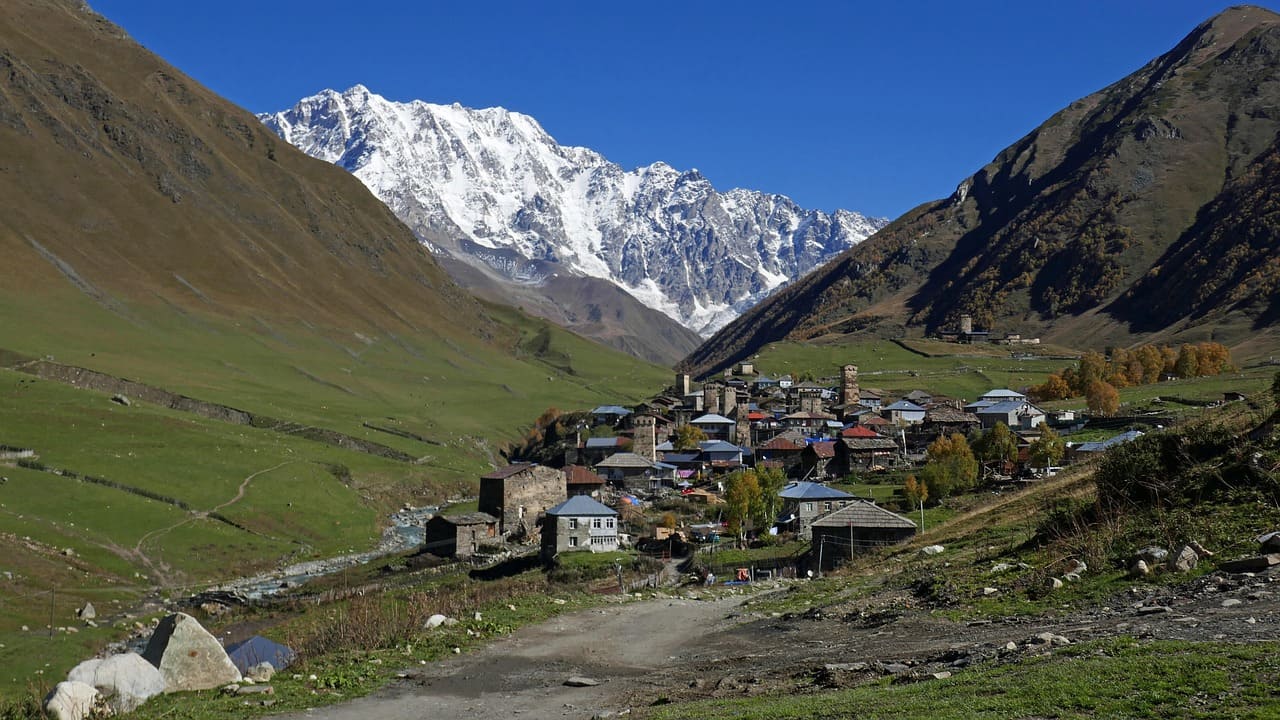 Rental car on Georgia mountain road to Kazbegi — Rentrals.com self-drive route guide